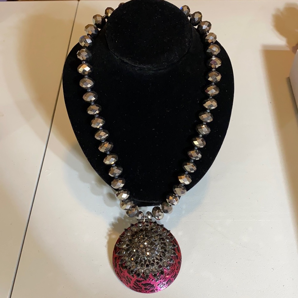 Boutique made dark grey beaded necklace with blingy black and pink pendant